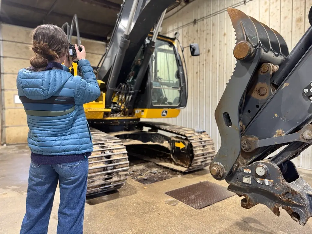 Rachel Lefor, digital media specialist at CROFT, photographing equipment for clients' content and SEO